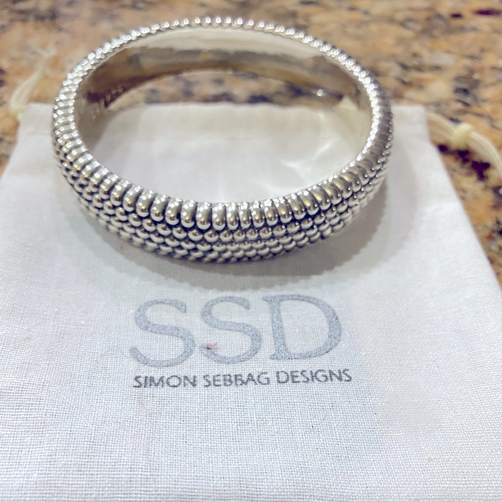 Simon Sebbag Designs bracelet in sterling silver. Will fit 7.5”wrist easily.
